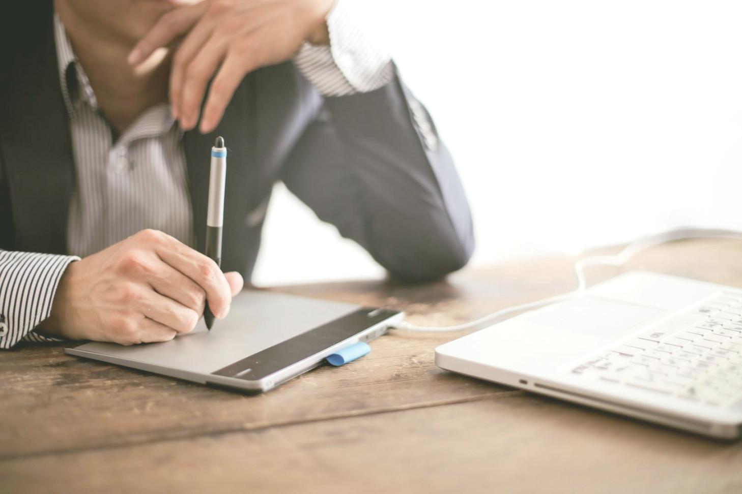 Digital marketing team analyzing SEO performance data and content strategy metrics on multiple screens